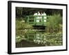 Four Nuns Standing on the Japanese Bridge in the Garden of the Impressionist Painter Claude Monet-David Hughes-Framed Photographic Print