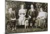 Four People and a Dog in a Garden-null-Mounted Photographic Print