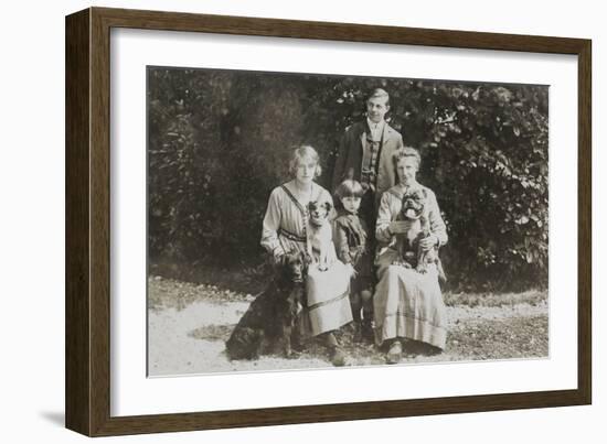 Four People and Three Dogs in a Garden-null-Framed Photographic Print