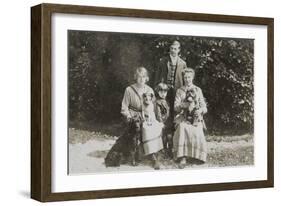 Four People and Three Dogs in a Garden-null-Framed Photographic Print