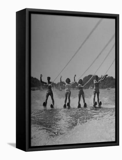 Four People Competing in the National Water Skiing Championship Tournament-Mark Kauffman-Framed Stretched Canvas