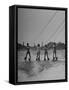 Four People Competing in the National Water Skiing Championship Tournament-Mark Kauffman-Framed Stretched Canvas