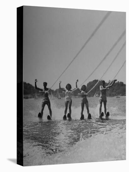 Four People Competing in the National Water Skiing Championship Tournament-Mark Kauffman-Stretched Canvas