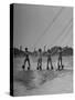 Four People Competing in the National Water Skiing Championship Tournament-Mark Kauffman-Stretched Canvas