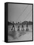 Four People Competing in the National Water Skiing Championship Tournament-Mark Kauffman-Framed Stretched Canvas