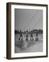 Four People Competing in the National Water Skiing Championship Tournament-Mark Kauffman-Framed Photographic Print