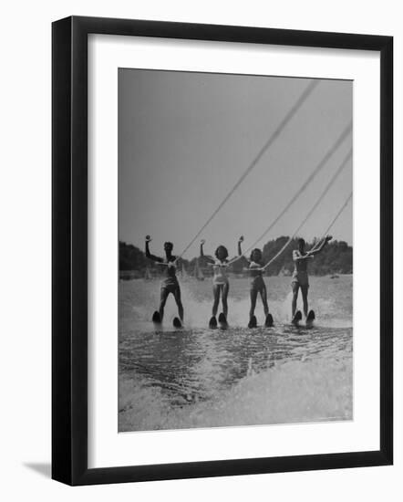 Four People Competing in the National Water Skiing Championship Tournament-Mark Kauffman-Framed Photographic Print