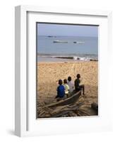 Four Small Boys Look Out to Sea from Where They Sit on Bamboo Fishing Boat on Island of Princip�-Camilla Watson-Framed Photographic Print