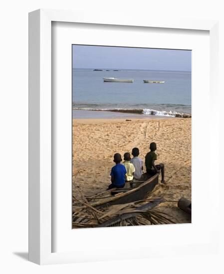 Four Small Boys Look Out to Sea from Where They Sit on Bamboo Fishing Boat on Island of Princip�-Camilla Watson-Framed Photographic Print