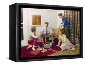 Four Smartly-Dressed Teenagers Having Cocktails around a Record Player-null-Framed Stretched Canvas