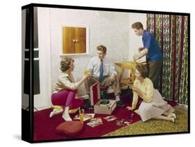 Four Smartly-Dressed Teenagers Having Cocktails around a Record Player-null-Stretched Canvas