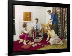 Four Smartly-Dressed Teenagers Having Cocktails around a Record Player-null-Framed Photographic Print
