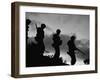 Four Soldiers with Helmets and Rifles Moving on Crest of Ridge, on Patrol at Night-Michael Rougier-Framed Photographic Print