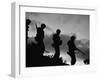 Four Soldiers with Helmets and Rifles Moving on Crest of Ridge, on Patrol at Night-Michael Rougier-Framed Photographic Print