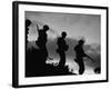 Four Soldiers with Helmets and Rifles Moving on Crest of Ridge, on Patrol at Night-Michael Rougier-Framed Photographic Print