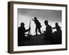 Four Soldiers with Helmets and Rifles Moving on Crest of Ridge, Patroling at Night-Michael Rougier-Framed Photographic Print