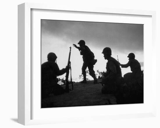 Four Soldiers with Helmets and Rifles Moving on Crest of Ridge, Patroling at Night-Michael Rougier-Framed Photographic Print