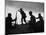 Four Soldiers with Helmets and Rifles Moving on Crest of Ridge, Patroling at Night-Michael Rougier-Mounted Photographic Print