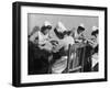 Four Young British Student Nurses Making Notes Together from Medical Textbooks-null-Framed Photographic Print