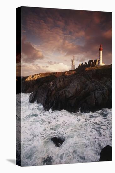 France, Brittany, Finistere, Saint-Mathieu. Lighthouse at Dawn-Walter Bibikow-Stretched Canvas
