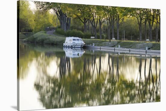 France, Burgundy, Nievre, Cercy La Tour. Canal Boat at the Dock-Kevin Oke-Stretched Canvas