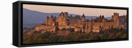 France, Languedoc-Rousillon, Carcassonne; the Fortifications of Carcassonne at Dusk-Katie Garrod-Framed Stretched Canvas