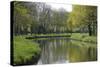 France, Loire. Canal Winding Through Spring Trees and Foliage-Kevin Oke-Stretched Canvas