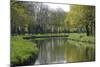 France, Loire. Canal Winding Through Spring Trees and Foliage-Kevin Oke-Mounted Photographic Print