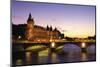 France, Paris, River Seine and Conciergerie at dusk.-Sergio Pitamitz-Mounted Photographic Print