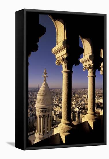 FRANCE, Paris.  View from Sacre-Coeur de Basilica through arches-Inger Hogstrom-Framed Stretched Canvas