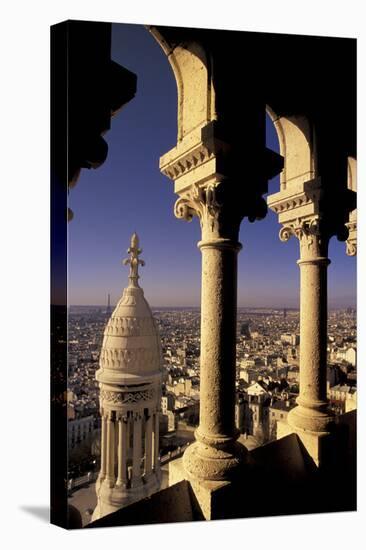 FRANCE, Paris.  View from Sacre-Coeur de Basilica through arches-Inger Hogstrom-Stretched Canvas