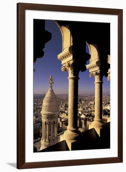 FRANCE, Paris.  View from Sacre-Coeur de Basilica through arches-Inger Hogstrom-Framed Photographic Print