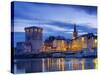France, Poitou-Charentes, La Rochelle, Town Reflected in Harbour at Dusk-Shaun Egan-Stretched Canvas