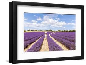 France, Provence Alps Cote D'Azur, Vaucluse, Banon. Woman Walking in Lavender Field in Summer (Mr)-Matteo Colombo-Framed Photographic Print