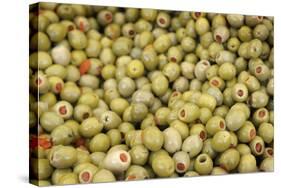 France, Vaucluse, Lourmarin. Green Olives with Pimentos Been Sold-Kevin Oke-Stretched Canvas