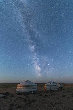 Mongolian traditional gers under the Milky Way, Ulziit, Middle Gobi province, Mongolia, Central Asi
