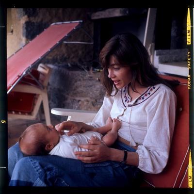 https://imgc.allpostersimages.com/img/posters/francoise-hardy-and-her-son-thomas_u-L-Q1INR830.jpg?artPerspective=n