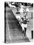 Distance Champion Emil Zatopek as He Set a New 10,000 Meter Record During the Olympic Games-Frank Scherschel-Stretched Canvas