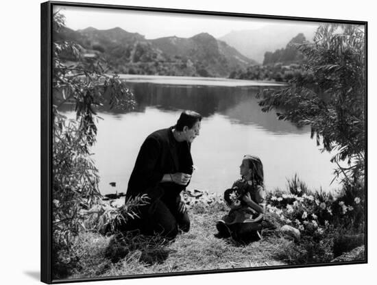 FRANKENSTE 1931 directed by JAMES WHALE Boris Karloff and Marilyn Harris (b/w photo)-null-Framed Photo