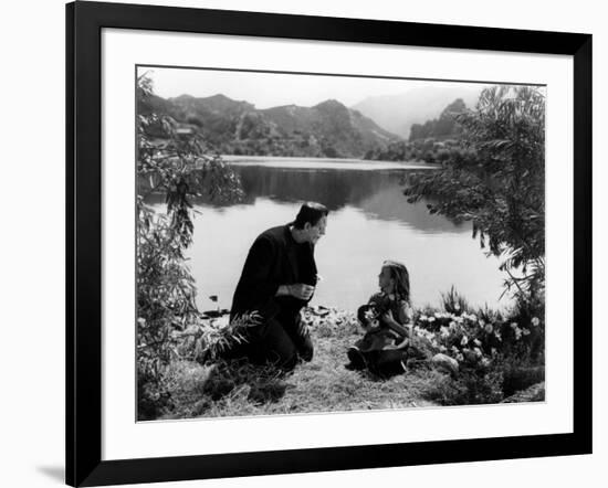 FRANKENSTE 1931 directed by JAMES WHALE Boris Karloff and Marilyn Harris (b/w photo)-null-Framed Photo