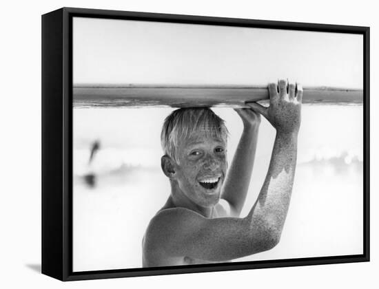 Freckled Surfer Larry Shaw Carrying Surfboard on His Head-Allan Grant-Framed Stretched Canvas