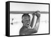 Freckled Surfer Larry Shaw Carrying Surfboard on His Head-Allan Grant-Framed Stretched Canvas