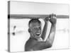 Freckled Surfer Larry Shaw Carrying Surfboard on His Head-Allan Grant-Stretched Canvas