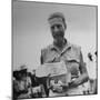 Freed American Pow Holding Red Cross Supplies after His Release from a Japanese Prison Camp-Carl Mydans-Mounted Photographic Print