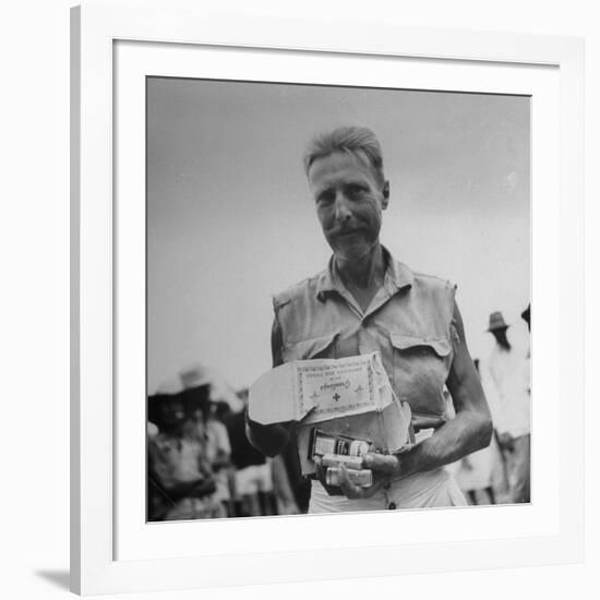 Freed American Pow Holding Red Cross Supplies after His Release from a Japanese Prison Camp-Carl Mydans-Framed Photographic Print