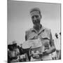 Freed American Pow Holding Red Cross Supplies after His Release from a Japanese Prison Camp-Carl Mydans-Mounted Photographic Print
