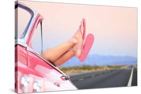 Freedom Car Travel Concept - Woman Relaxing with Feet out of Window in Cool Convertible Vintage Car-Maridav-Stretched Canvas