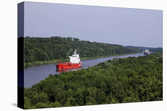 Freight Ships on Kiel Canal going near Hochdonn, Dithmarschen, Schleswig-Holstein, Germany, Europe-Hans-Peter Merten-Stretched Canvas