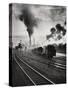 Freight Train in Front of Smoking Chimney Stacks, Nostalgia-null-Stretched Canvas