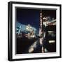 Fremont Street at Night Lit Up by Gambling Casino Neon Signs-Nat Farbman-Framed Photographic Print